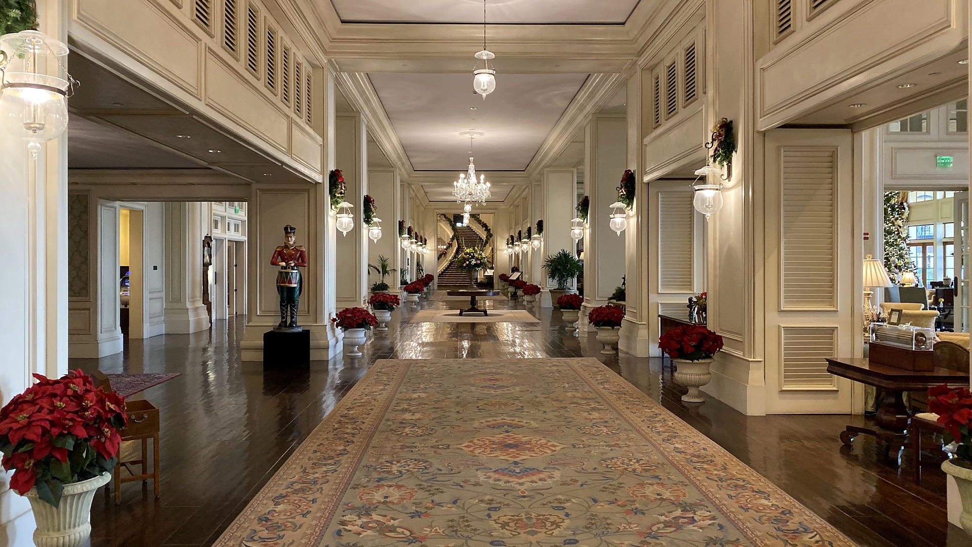 The Sanctuary lobby on Kiawah Island decorated with poinsettias and wreaths for Christmas